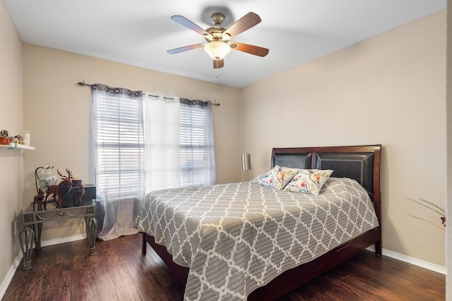 bedroom featuring dark hardwood / wood-style floors and ceiling fan