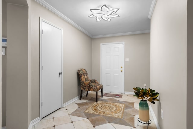 entrance foyer featuring ornamental molding and light tile patterned floors