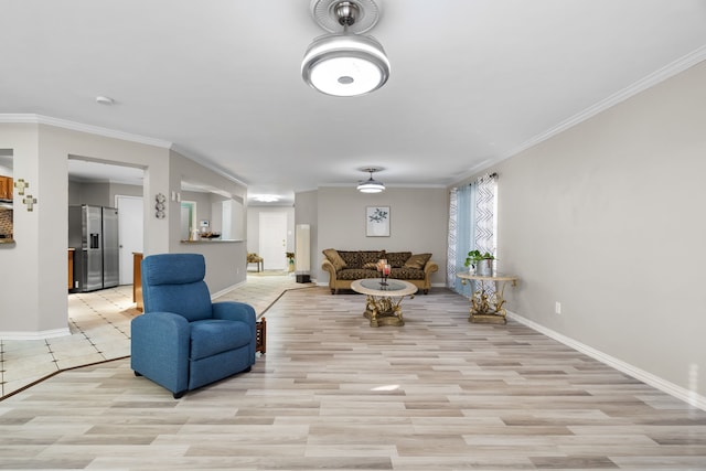 living room featuring crown molding and light wood-type flooring