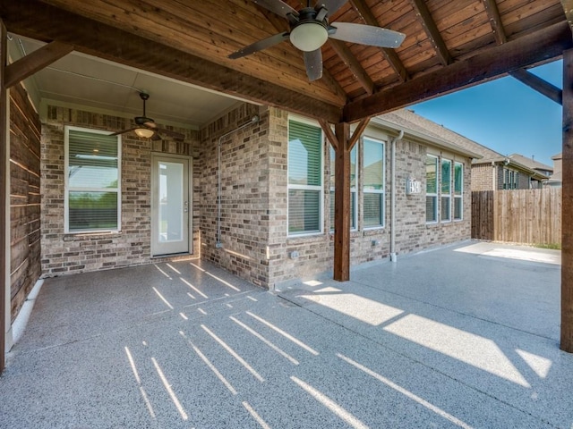 view of patio featuring ceiling fan