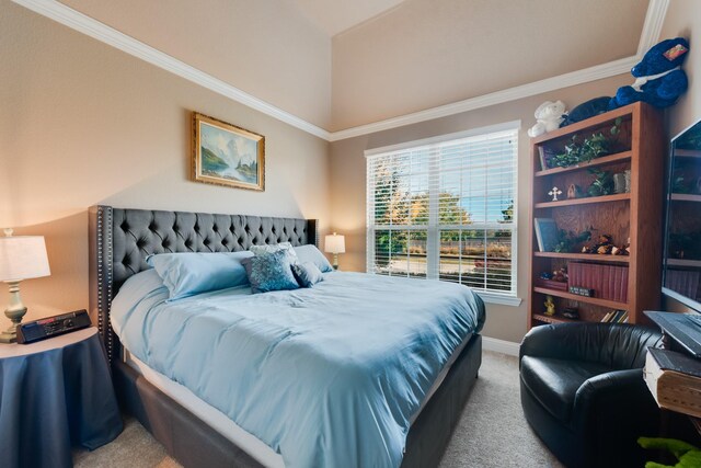 bedroom featuring ornamental molding and carpet flooring