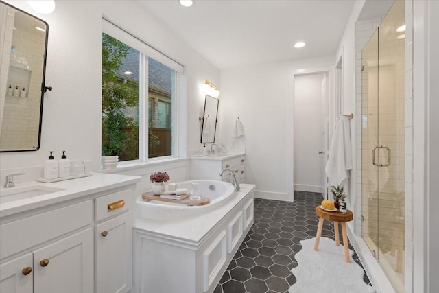 bathroom with vanity and walk in shower