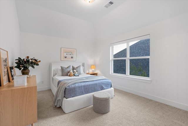 bedroom featuring carpet