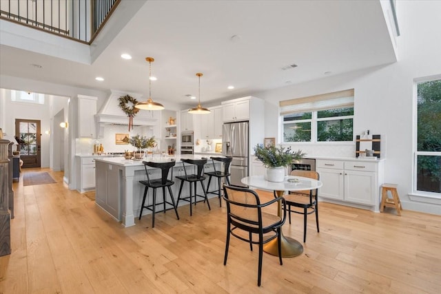 dining room with light hardwood / wood-style flooring