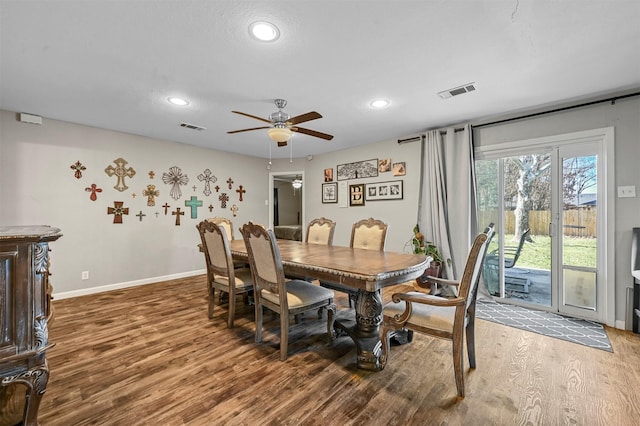 dining area featuring ceiling fan and wood-type flooring