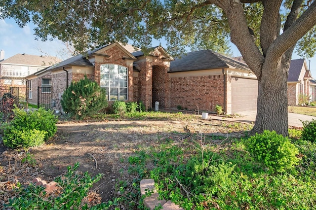 single story home with a garage