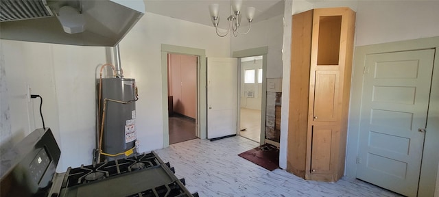 kitchen featuring gas water heater and a notable chandelier