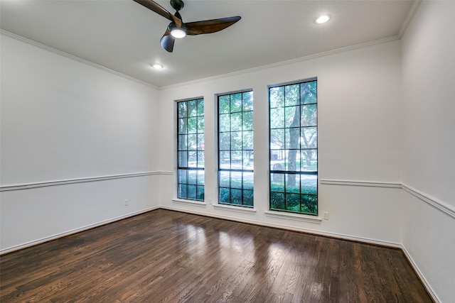 unfurnished room with dark hardwood / wood-style floors, ceiling fan, and ornamental molding