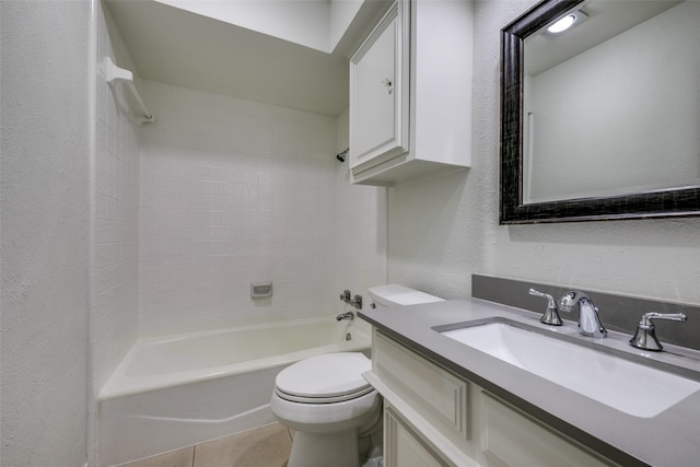 full bathroom with toilet, vanity, tile patterned floors, and tiled shower / bath combo