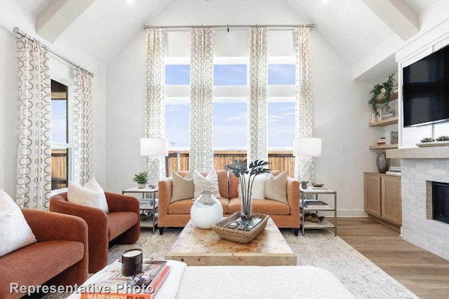 living room featuring light hardwood / wood-style floors and lofted ceiling