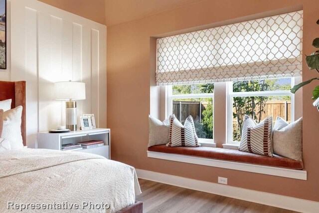 bedroom featuring light hardwood / wood-style flooring