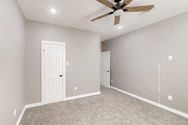 kitchen with pendant lighting, sink, white cabinets, stainless steel dishwasher, and light hardwood / wood-style floors