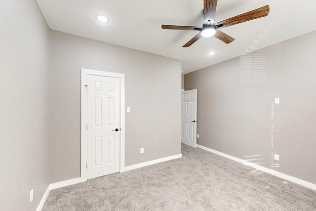 unfurnished room featuring ceiling fan and light hardwood / wood-style floors