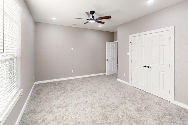 bathroom featuring vanity, toilet, and walk in shower