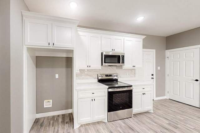 entrance foyer featuring ceiling fan and light hardwood / wood-style floors