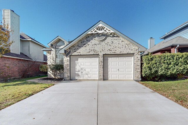 garage featuring a yard