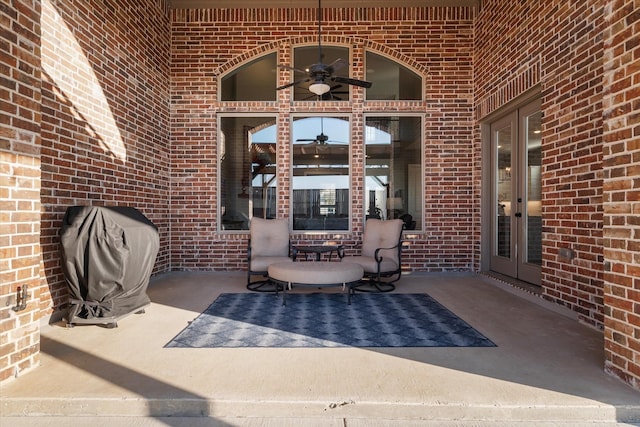 view of patio featuring french doors and a grill