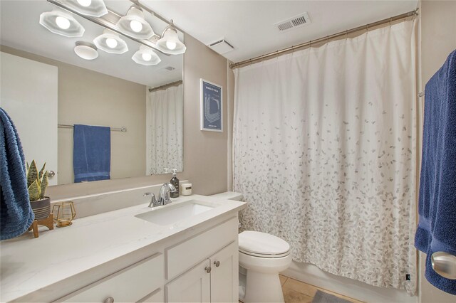 washroom with stacked washer and dryer, light tile patterned floors, laundry area, and crown molding