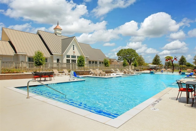 view of pool featuring a patio