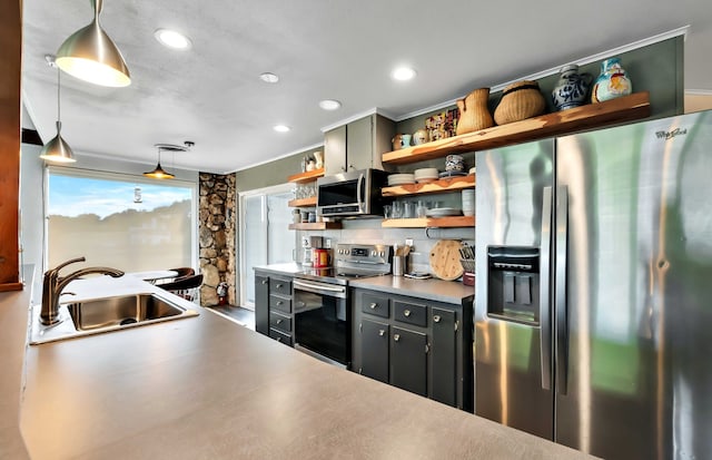 kitchen featuring backsplash, decorative light fixtures, sink, and appliances with stainless steel finishes