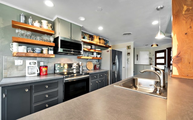 kitchen with sink, hanging light fixtures, stainless steel appliances, tasteful backsplash, and crown molding