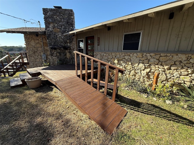 wooden deck with a yard