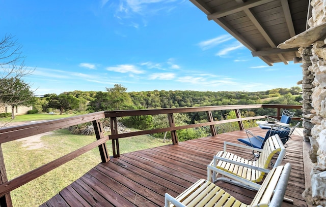 deck featuring a yard