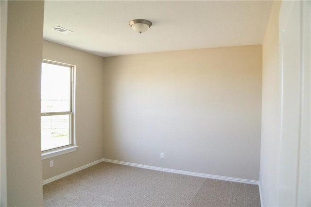 view of carpeted spare room