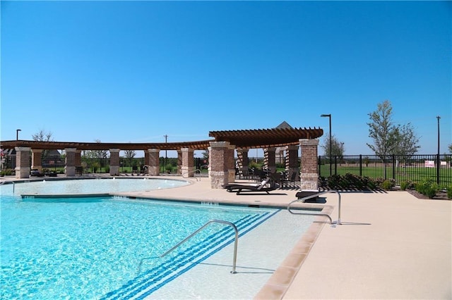 view of pool featuring a pergola and a patio