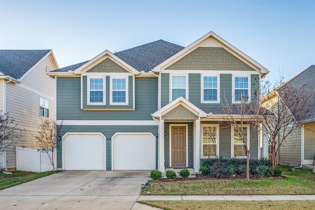 view of front of property with a garage