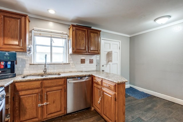 kitchen featuring appliances with stainless steel finishes, dark hardwood / wood-style floors, decorative backsplash, and sink