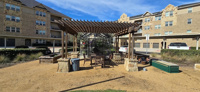 view of home's community with a pergola