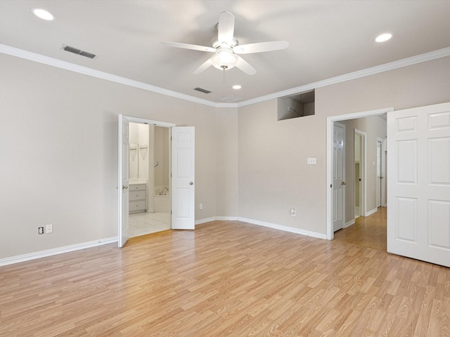 empty room with light hardwood / wood-style floors, ornamental molding, and ceiling fan