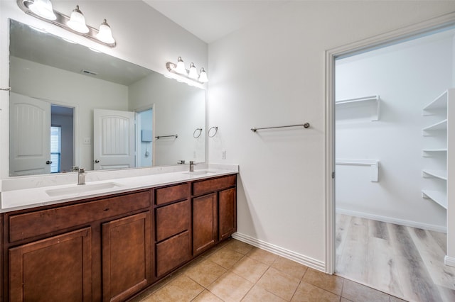 bathroom featuring vanity and tile patterned floors