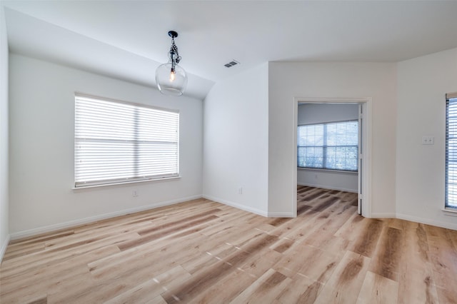 unfurnished room featuring light hardwood / wood-style flooring