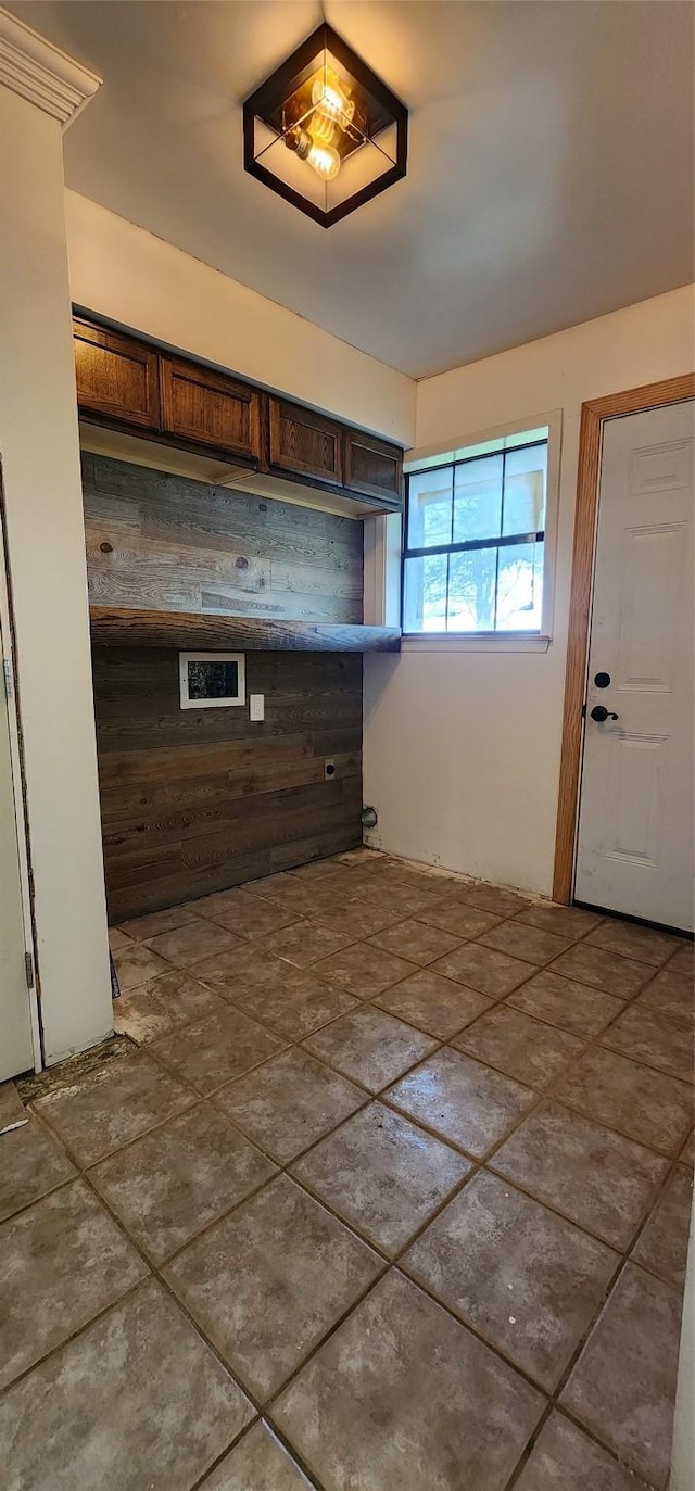 kitchen featuring dark brown cabinets