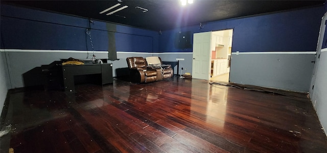 sitting room with hardwood / wood-style flooring