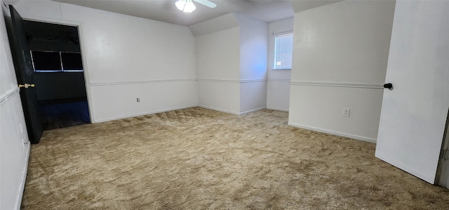 unfurnished room featuring ceiling fan and light colored carpet