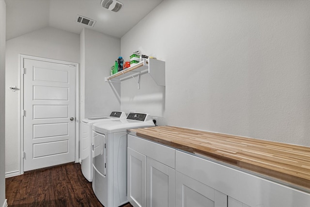 laundry room featuring dark hardwood / wood-style floors and independent washer and dryer