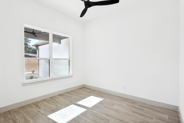 unfurnished room with light hardwood / wood-style floors and ceiling fan