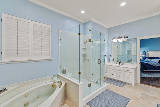 bathroom featuring independent shower and bath, vanity, ornamental molding, and tile patterned floors