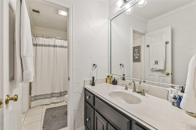 bathroom with ornamental molding, toilet, tile patterned floors, and vanity