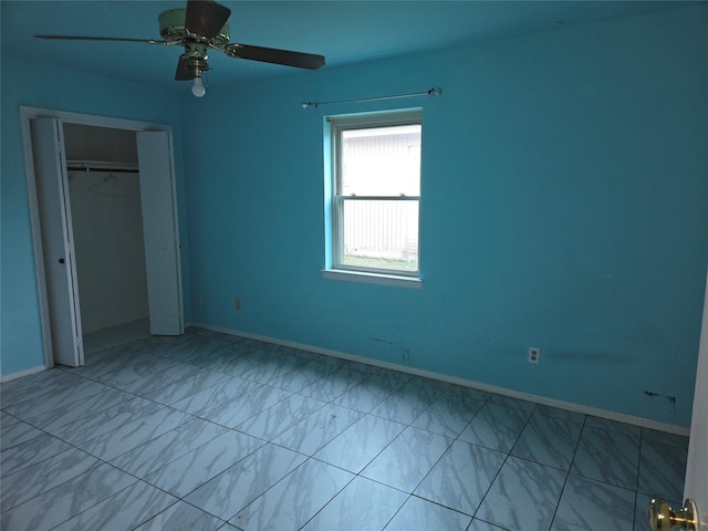 unfurnished bedroom with a closet and ceiling fan