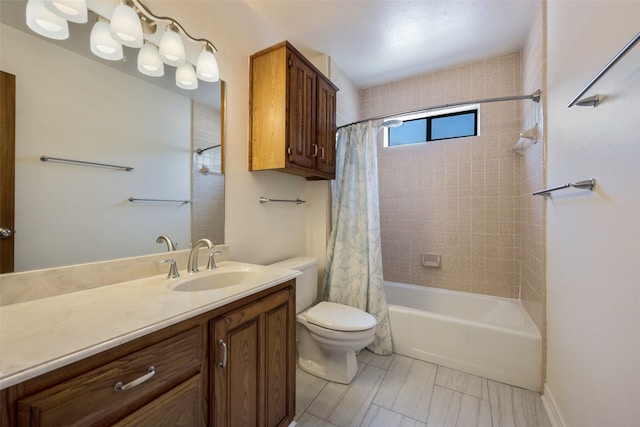 full bathroom featuring shower / tub combo, vanity, and toilet