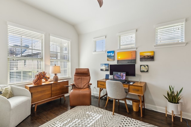 office space featuring dark wood-type flooring and vaulted ceiling