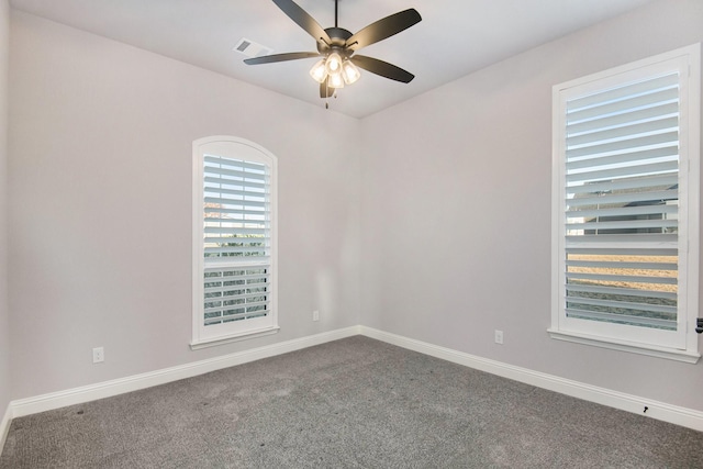 unfurnished room featuring carpet and ceiling fan