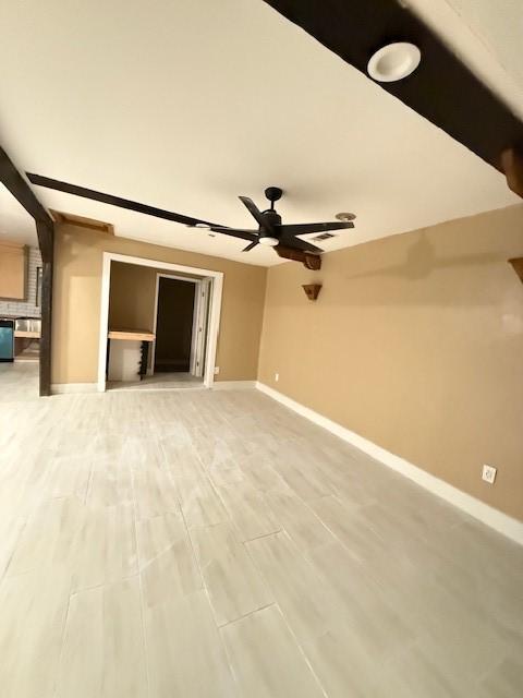 interior space with ceiling fan and hardwood / wood-style floors