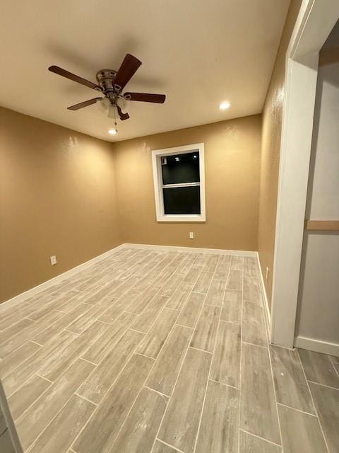 empty room featuring ceiling fan