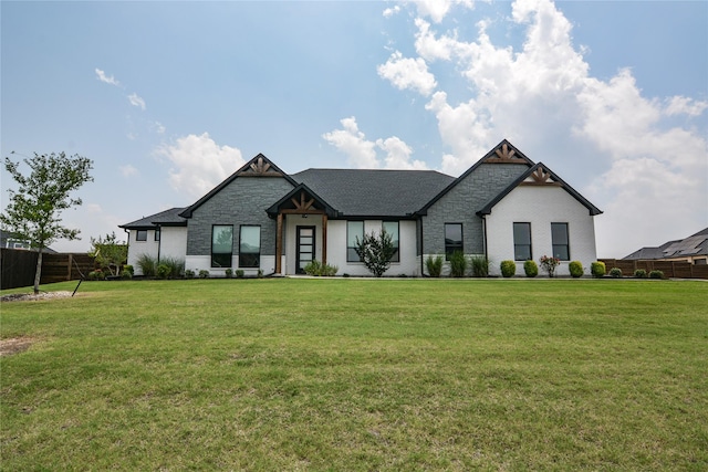 view of front of home with a front lawn