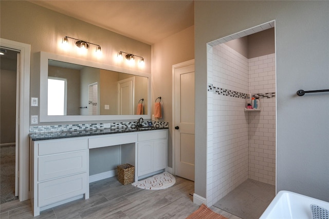 bathroom with vanity, separate shower and tub, and hardwood / wood-style floors